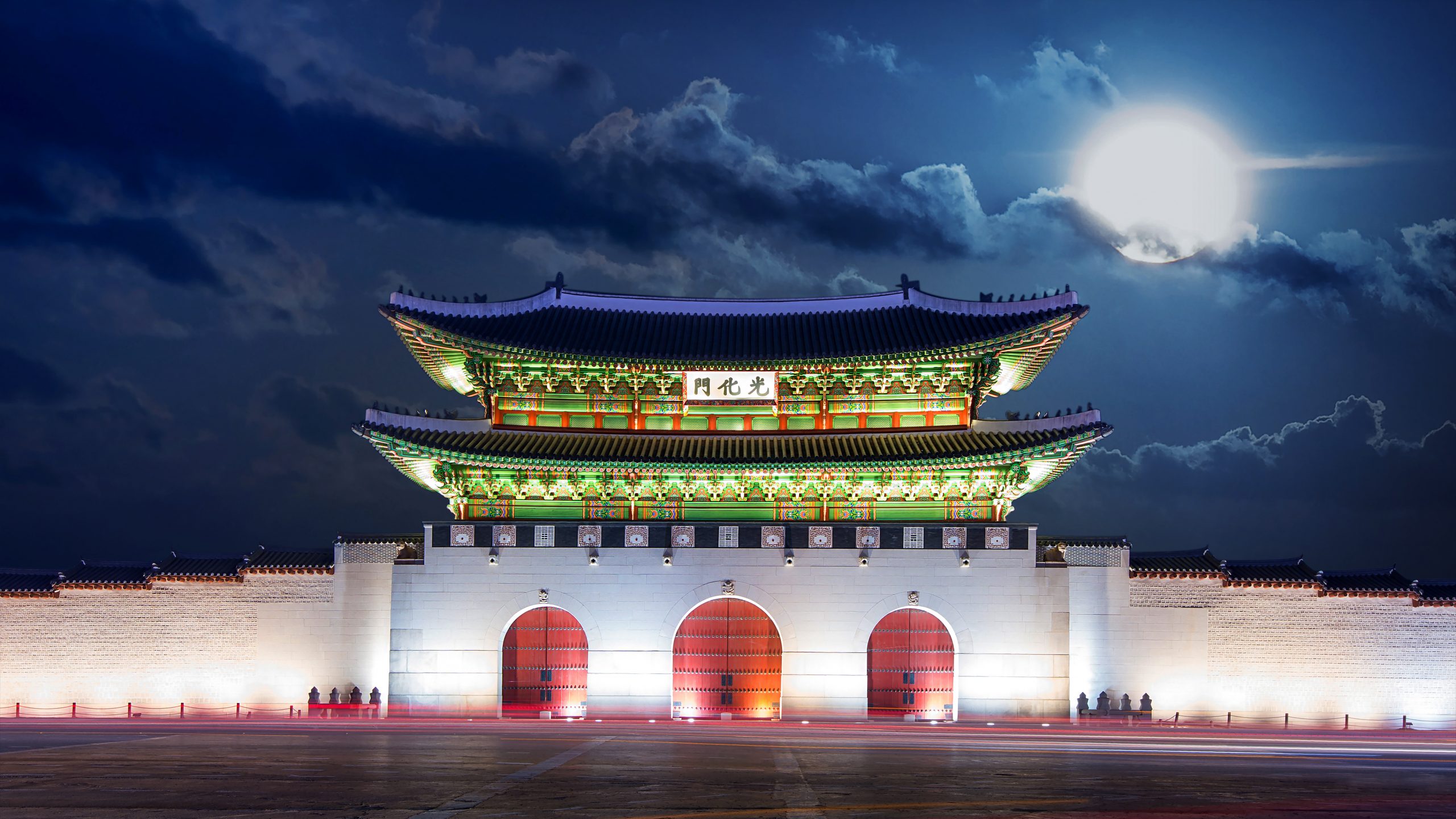 Gyeongbokgung palace and full moon at night in Seoul, South Kore